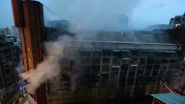 the blaze broke out in the 13 storey mixed use building in the small hours of thursday morning photo afp the blaze broke out in the 13 storey mixed use building in the small hours of thursday morning photo afp