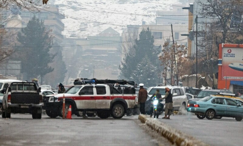 taliban security forces block a road after a suicide blast near afghanistan s foreign ministry at the zanbaq square in kabul on january 11 photo afp