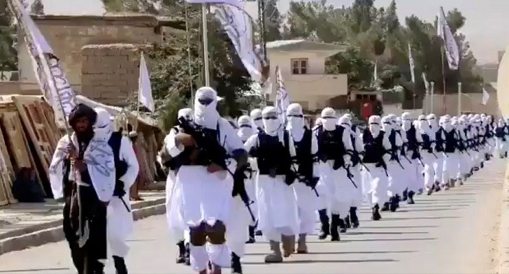 Taliban fighters march in uniforms on the street in Qalat, Zabul Province, Afghanistan, in this still image taken from social media video uploaded August 19, 2021 and obtained by REUTERS. PHOTO: Reuters