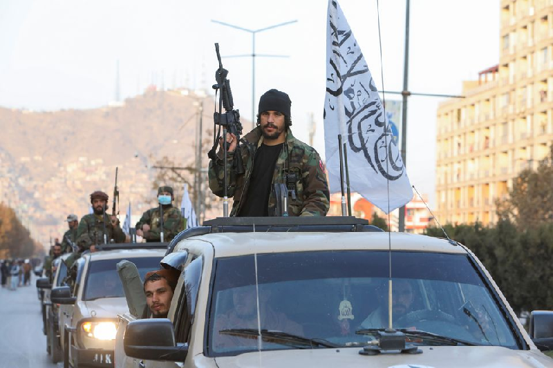 taliban forces ride in a car during a taliban military parade in kabul afghanistan november 14 2021 photo reuters