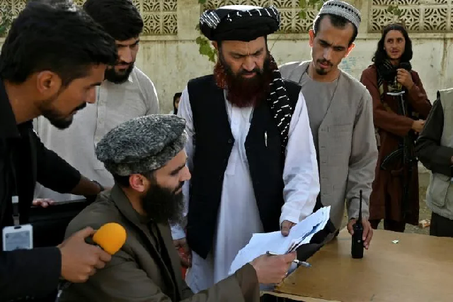 alam gul haqqani c head of the passport office says the taliban will resume issuing passports after a deluge of applications caused biometric equipment to break down photo afp