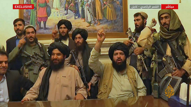 an image grab taken from qatar based al jazeera shows members of taliban taking control of the presidential palace in kabul photo afp file an image grab taken from qatar based al jazeera shows members of taliban taking control of the presidential palace in kabul photo afp file