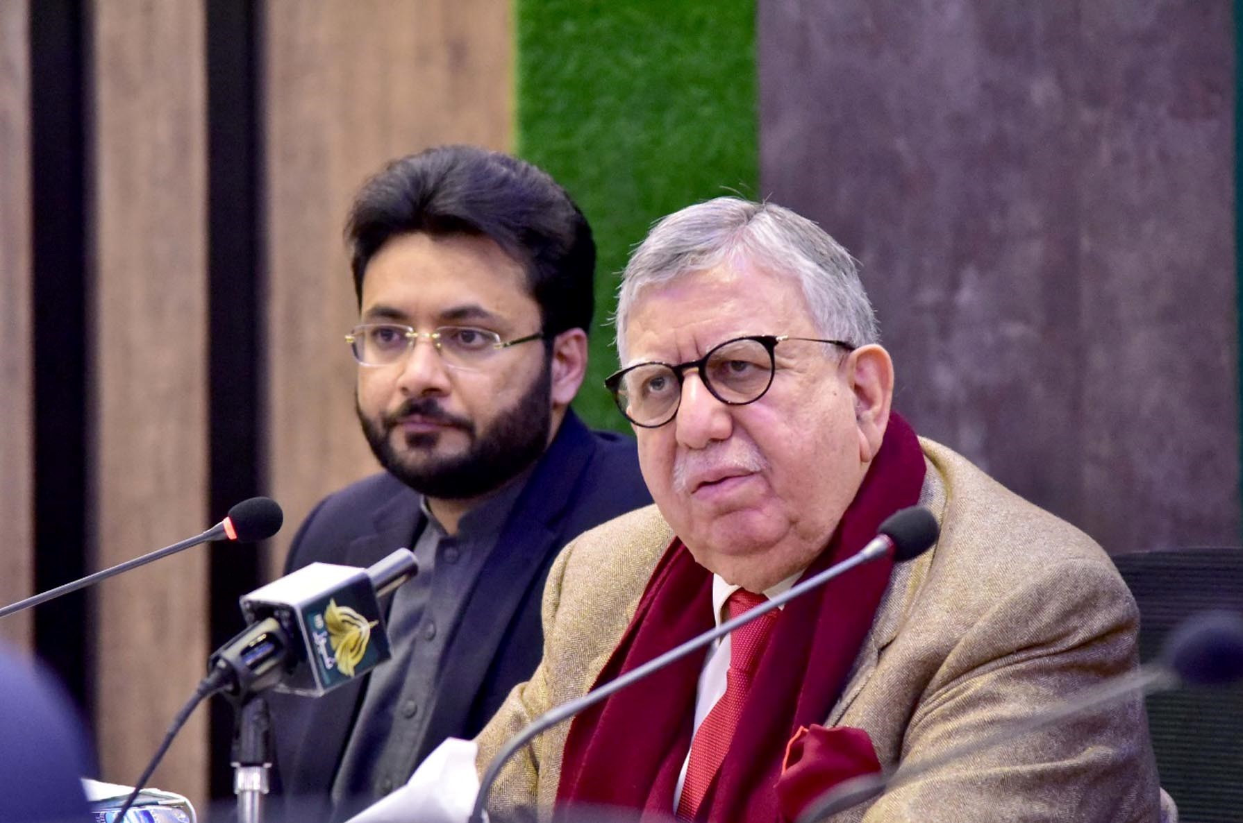 finance minister shaukat tarin and minister of state for information and broadcasting farrukh habib address a press conference on dec 30 2021 photo pid