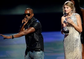 billboard faces backlash for featuring taylor swift s wax figure from ye s famous video