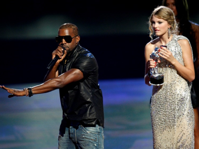 billboard faces backlash for featuring taylor swift s wax figure from ye s famous video