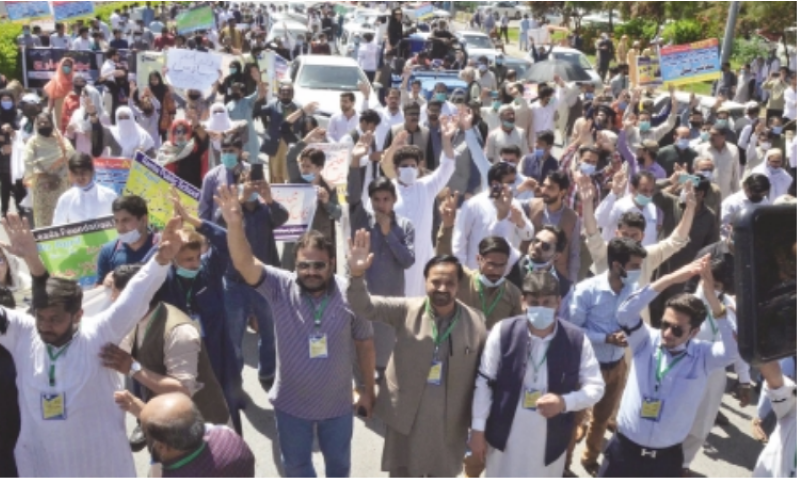 enough is enough educators non teaching staff of private schools and van drivers shout slogans against prolonged closure of educational institutions during their demonstration in the federal capital