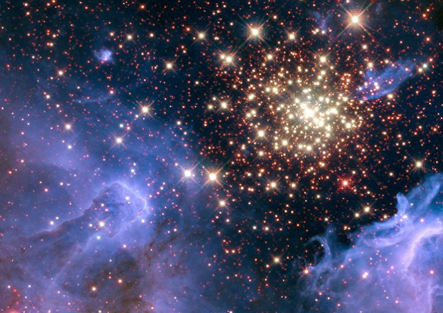 a cluster of young stars resembles an aerial burst surrounded by clouds of interstellar gas and dust in a nebula ngc 3603 located in the constellation carina in this image captured in august 2009 and december 2009 and obtained september 26 2018 photo reuters