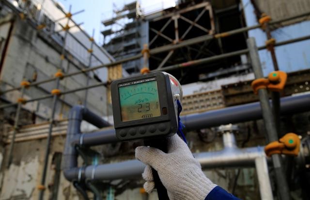 A Geiger counter shows a radiation level of 231 microsieverts per hour near the damaged No. 3 reactor building at the tsunami-crippled Fukushima Daiichi nuclear power plant in Okuma town, Fukushima prefecture, Japan March 1, 2021. Picture taken March 1, 2021. PHOTO: REUTERS
