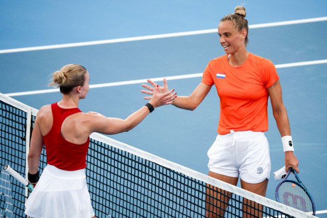 netherlands arantxa rus r shakes hands with norway s malene helgo after winning their women s singles match at the united cup in ken rosewall arena in sydney on saturday photo afp netherlands arantxa rus r shakes hands with norway s malene helgo after winning their women s singles match at the united cup in ken rosewall arena in sydney on saturday photo afp
