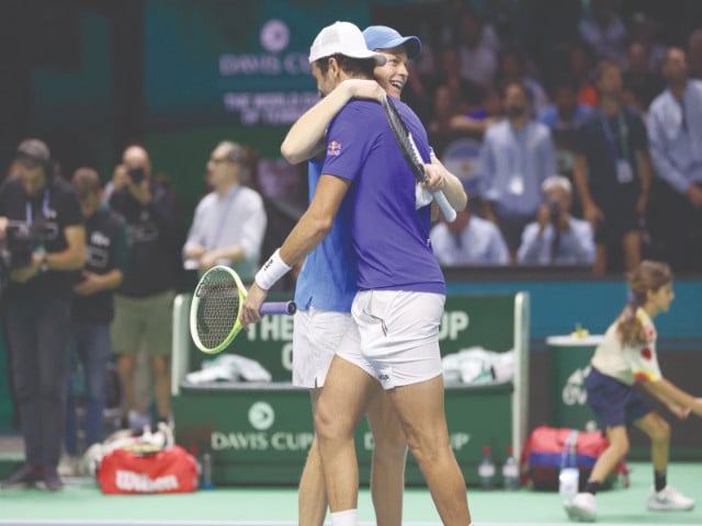 matteo berrettini r and jannik sinner of team italy celebrate after beating maximo gonzalez and andres molteni of team argentina during their quarter final doubles match at the davis cup finals photo afp