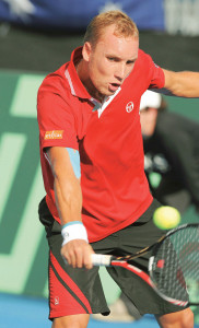 belgium win to stay in world group