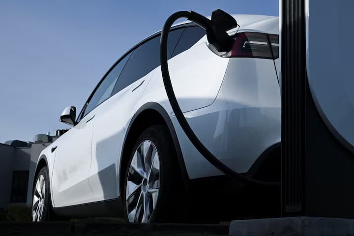a tesla car is being charged at a tesla electric vehicle charging station in wildau near berlin germany march 20 2024 photo reuters