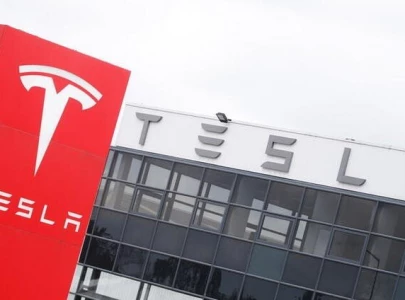 tesla sued by former employees over mass layoff