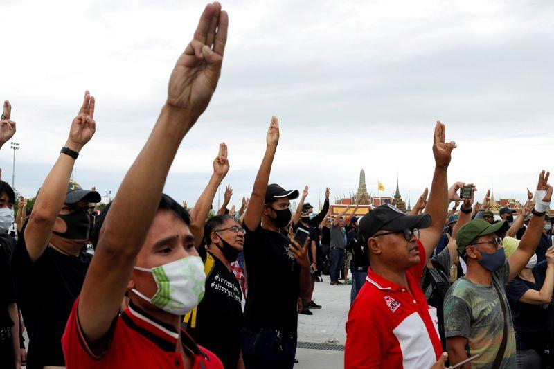 pro democracy protesters flashing the three fingers salute attend a mass rally to call for the ouster of prime minister prayuth chan ocha s government and reforms in the monarchy in bangkok thailand september 20 2020 photo reuters
