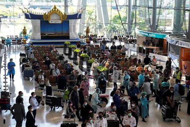 foreign tourists arrive at suvarnabhumi airport during the first day of the country s reopening campaign part of the government s plan to jump start the pandemic hit tourism sector in bangkok thailand november 1 2021 photo reuters