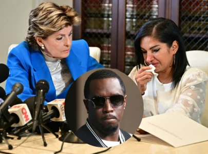 woman accuses diddy and bodyguard of drugging and assaulting her in 2001