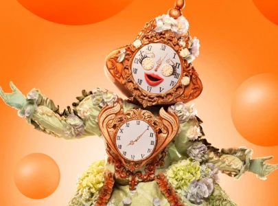 the masked singer semi finals clock finally revealed as grammy winning singer