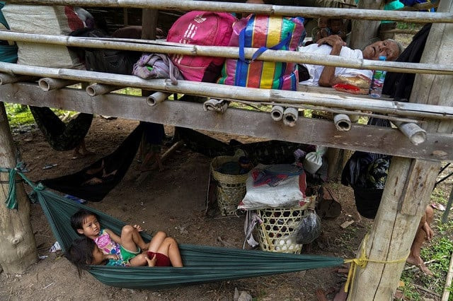 villagers who fled myanmar s ee thu hta displacement camp rest in mae hong son province thailand near the border while fleeing from gunfire between ethnic minority karen insurgents and myanmar military april 29 2021 photo reuters villagers who fled myanmar s ee thu hta displacement camp rest in mae hong son province thailand near the border while fleeing from gunfire between ethnic minority karen insurgents and myanmar military april 29 2021 photo reuters
