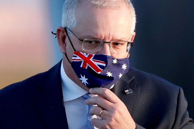 australian prime minister scott morrison arrives at haneda airport in tokyo japan november 17 2020 photo reuters