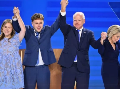 tim walz makes appearance at dnc with his family accepts nomination as kamala harris running mate