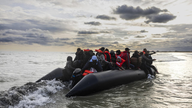 migrants board a smuggler s boat on the beach of gravelines in northern france on april 26 2024 file photo afp migrants board a smuggler s boat on the beach of gravelines in northern france on april 26 2024 file photo afp