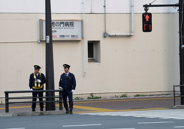 police officers stand guard near the us embassy in tokyo november 5 2017 photo reuters