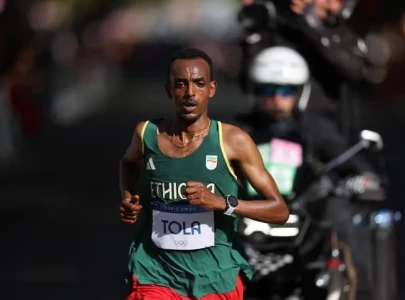 ethiopia s tola sets a new olympic marathon record ethiopia s tola sets a new olympic marathon record