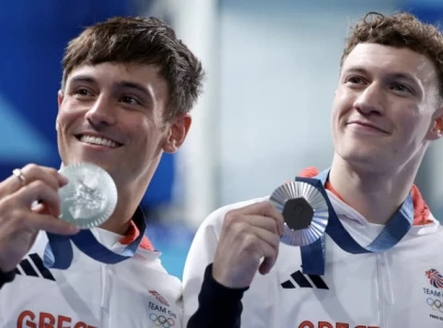 british diver tom daley secures silver medal at paris olympics in emotional comeback