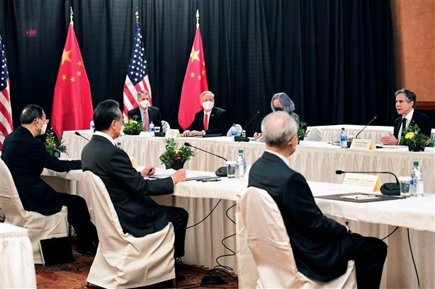 us secretary of state antony blinken 2nd r joined by national security advisor jake sullivan r speaks while facing yang jiechi 2nd l director of the central foreign affairs commission office and wang yi l china s state councilor and foreign minister at the opening session of us china talks at the captain cook hotel in anchorage alaska us march 18 2021 photo reuters