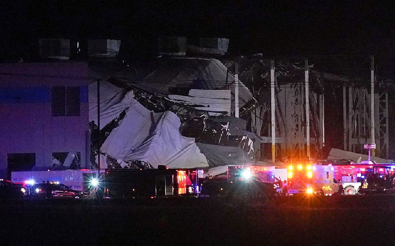 emergency vehicles surround the site of an amazon distribution warehouse with a collapsed roof after storms hit the area of edwardsville illinois us december 10 2021 photo reuters