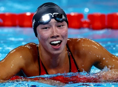 paris olympics huske edges out walsh for gold in women s 100m butterfly