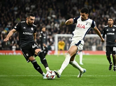 ten man tottenham topple qarabag ajax run riot against besiktas