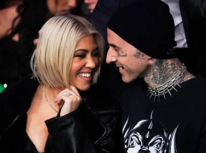 travis barker and kourtney kardashian barker the couple that sweats together stays together