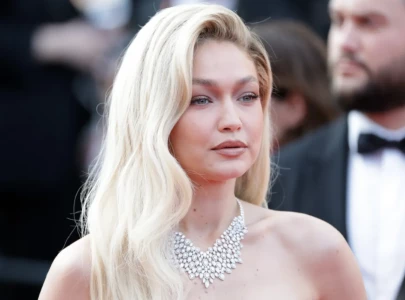 gigi hadid leads the runway at versace s spring summer 2025 show in milan