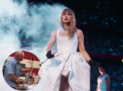 man smashes signed taylor swift guitar after buying it at auction