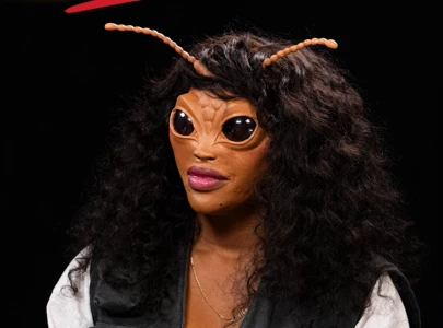 sza says she s tired of being not a bug in new hot ones teaser