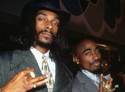 snoop dogg says 2pac was a better dad than him
