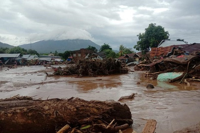 damaged houses are seen at an area affected by flash floods after heavy rains in east flores east nusa tenggara province indonesia april 4 2021 in this photo distributed by antara foto photo reuters