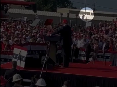 watch new footage of trump shooting shows gunman taking position before attack watch new footage of trump shooting shows gunman taking position before attack