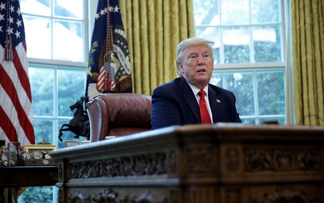 us president donald trump answers questions during an interview with reuters about china the novel coronavirus covid 19 pandemic and other subjects in the oval office of the white house in washington us april 29 2020 photo reuters