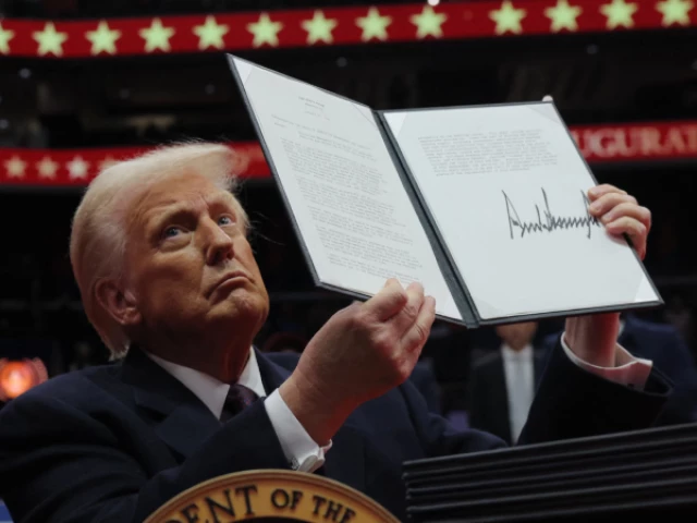 u s president donald trump presents an executive order during the inaugural parade u s january 20 2025 photo reuters u s president donald trump presents an executive order during the inaugural parade u s january 20 2025 photo reuters
