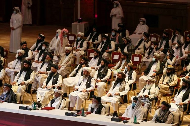 members of the taliban delegation attend the opening session of the peace talks between the afghan government and the taliban in the qatari capital doha on september 12 2020 photo afp file