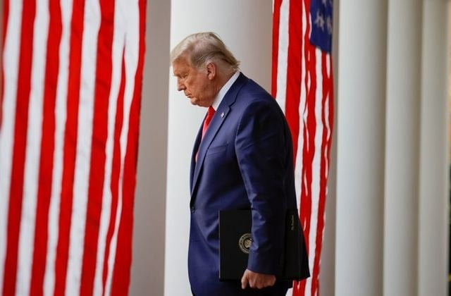 us president donald trump walks down the west wing colonnade from the oval office to the rose garden to deliver an update on the so called operation warp speed program the joint defense department and hhs initiative that has struck deals with several drugmakers in an effort to help speed up the search for effective treatments for the ongoing coronavirus disease covid 19 pandemic at the white house in washington us november 13 2020 photo reuters us president donald trump walks down the west wing colonnade from the oval office to the rose garden to deliver an update on the so called operation warp speed program the joint defense department and hhs initiative that has struck deals with several drugmakers in an effort to help speed up the search for effective treatments for the ongoing coronavirus disease covid 19 pandemic at the white house in washington us november 13 2020 photo reuters