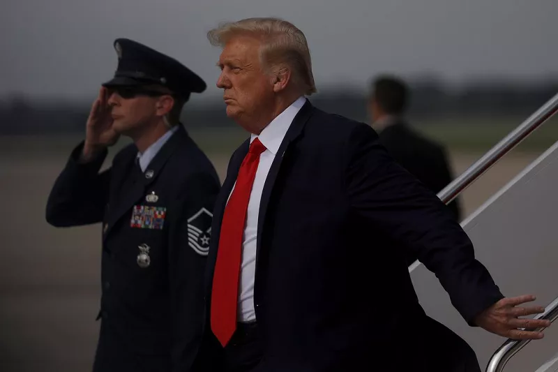 us president donald trump is saluted as he disembarks from air force one after returning to washington from travel to wilmington north carolina at joint base andrews maryland us september 2 2020 photo reuters us president donald trump is saluted as he disembarks from air force one after returning to washington from travel to wilmington north carolina at joint base andrews maryland us september 2 2020 photo reuters