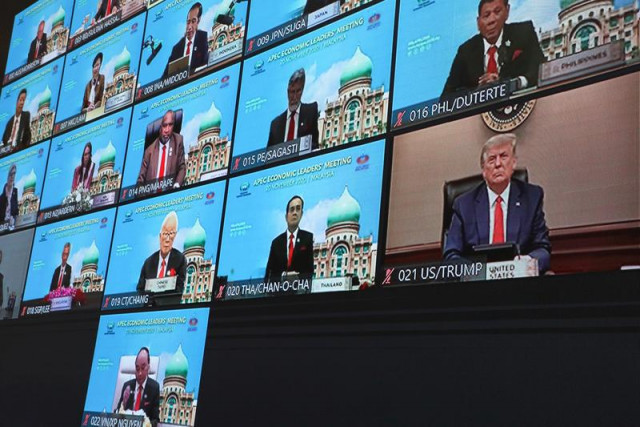 us president donald trump is seen on a screen attending the virtual apec economic leaders meeting 2020 in kuala lumpur malaysia november 20 2020 photo reuters us president donald trump is seen on a screen attending the virtual apec economic leaders meeting 2020 in kuala lumpur malaysia november 20 2020 photo reuters