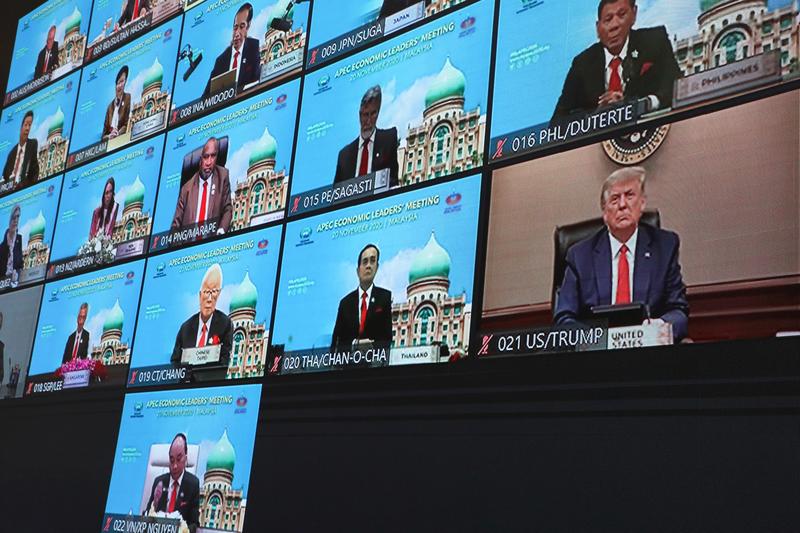 us president donald trump is seen on a screen attending the virtual apec economic leaders meeting 2020 in kuala lumpur malaysia november 20 2020 photo reuters