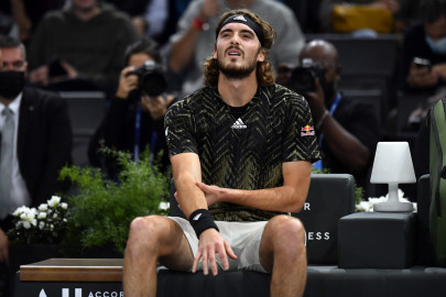 tsitsipas retires with arm injury as seeds fail in paris tsitsipas retires with arm injury as seeds fail in paris