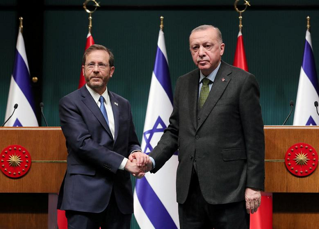 turkish president tayyip erdogan and his israeli counterpart isaac herzog shake hands during a joint news conference in ankara turkey march 9 2022 photo reuters