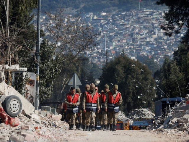 members of the military walk on the street in the aftermath of a deadly earthquake in antakya turkey february 16 2023 photo reuters