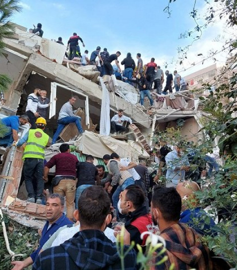 locals and officials search for survivors at a collapsed building in the coastal province of izmir turkey october 30 2020 photo reuters